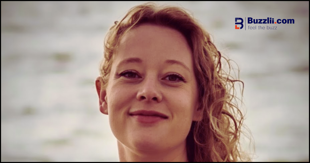 Home 5 Protesters holding signs during a vigil for Renee Nicole Good in Minneapolis
